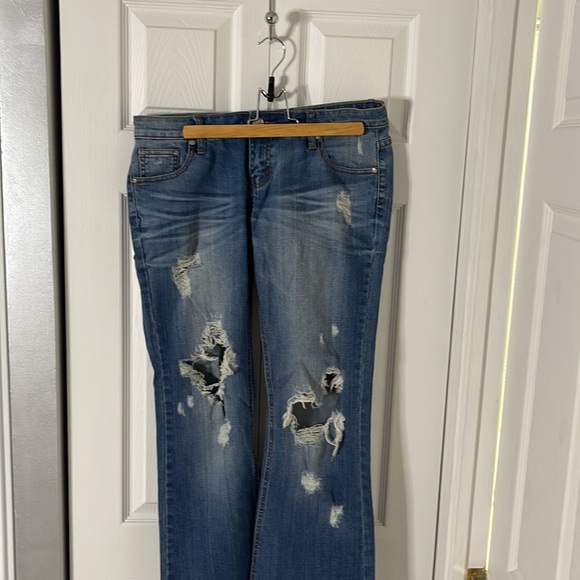 Straight leg blue women’s jeans Ripped knee wide leg blue Jeans size 31 no tags - Picture 1 of 11